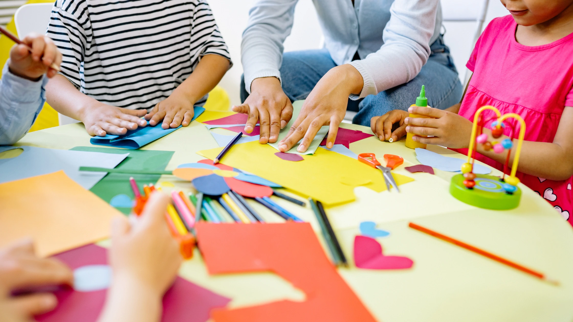 Children participating in creative craft activities